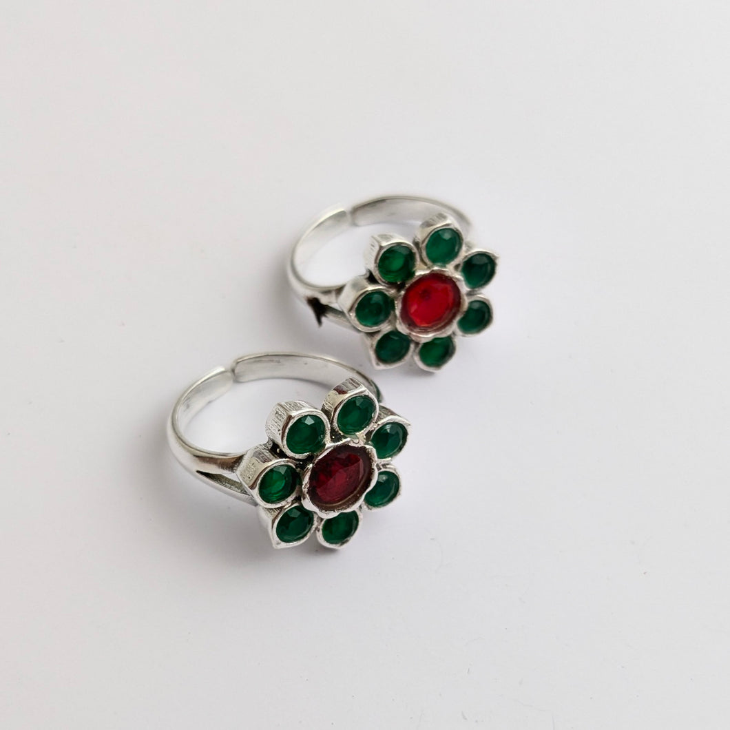 Silver toe ring with red green floral design